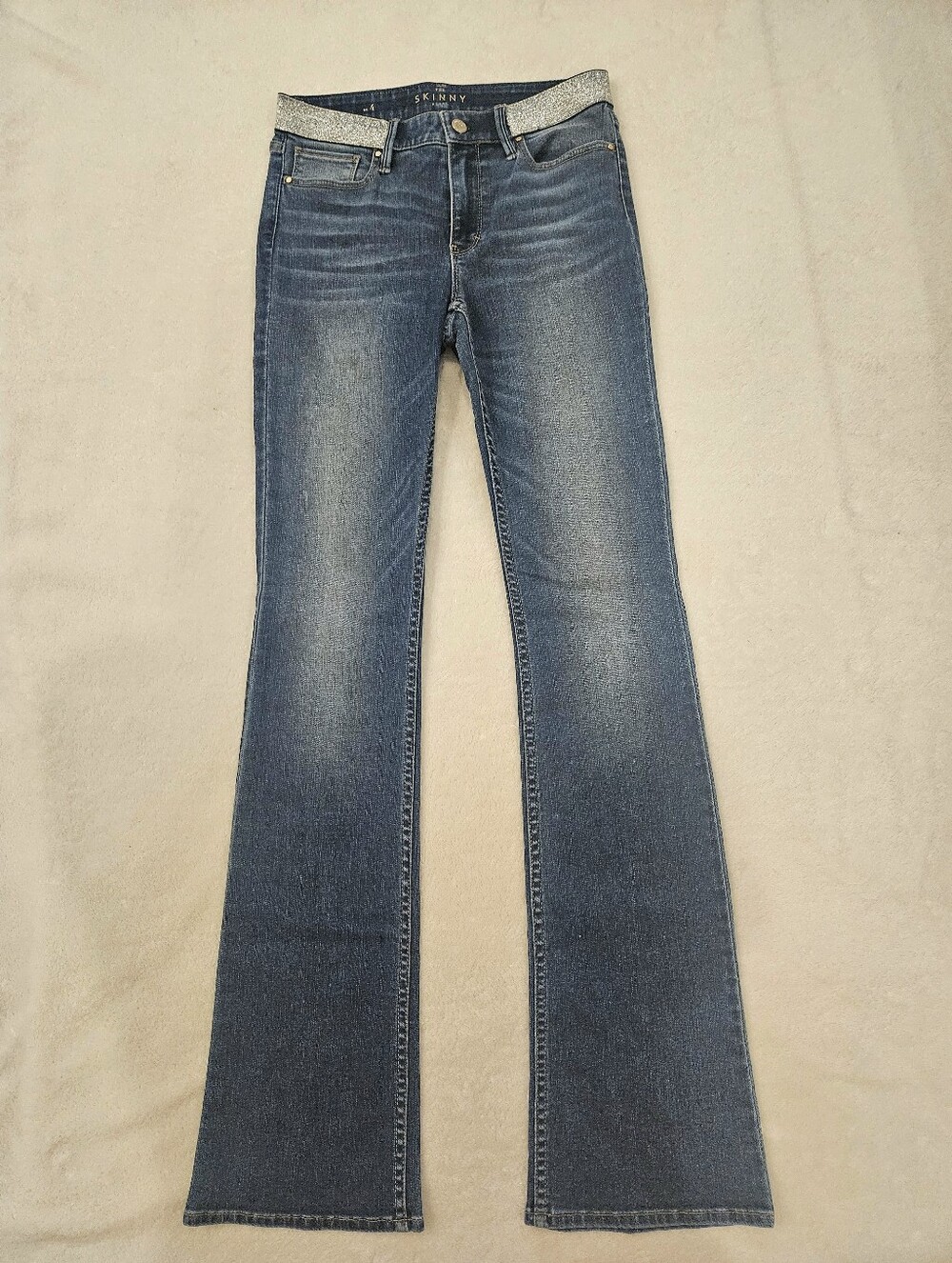 NWOT WHBM Blue Women's Stretch High-Waist Jeans With Silver Band.
